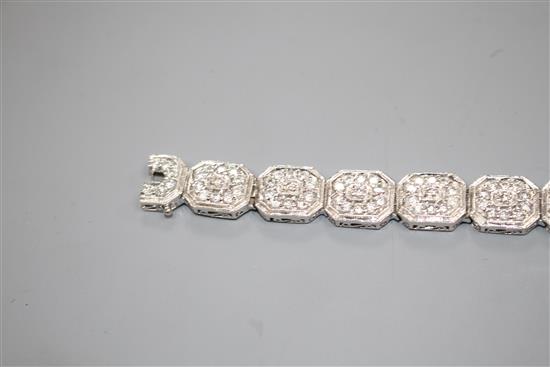 A modern 14k white metal and diamond encrusted octagonal link bracelet, 18.3cm, gross weight, 35.8 grams.